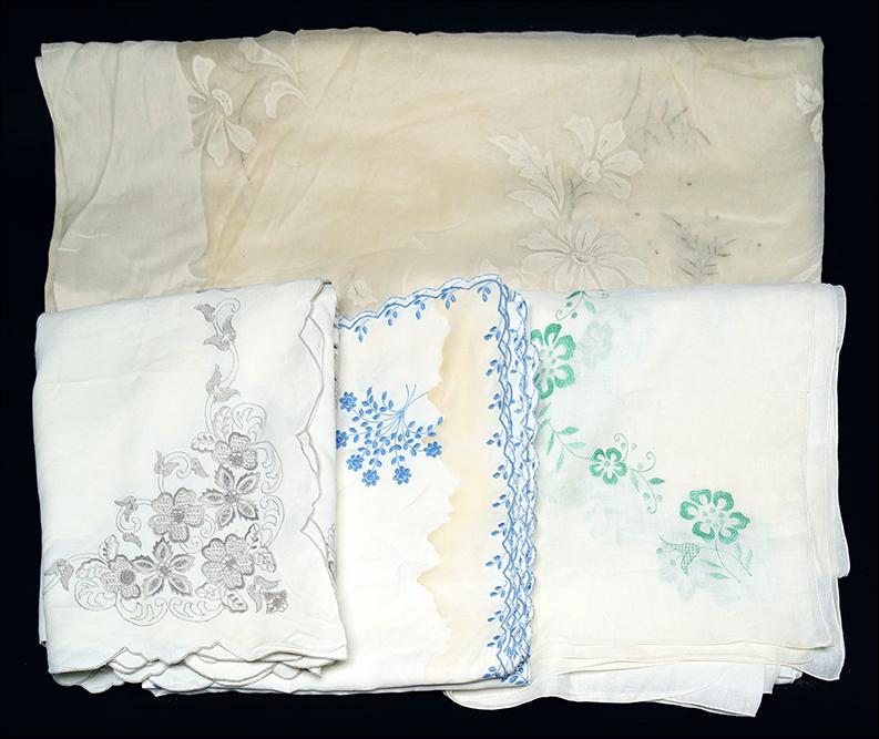 Four Embroidered Linen Tablecloths.: Four Embroidered Linen Tablecloths.