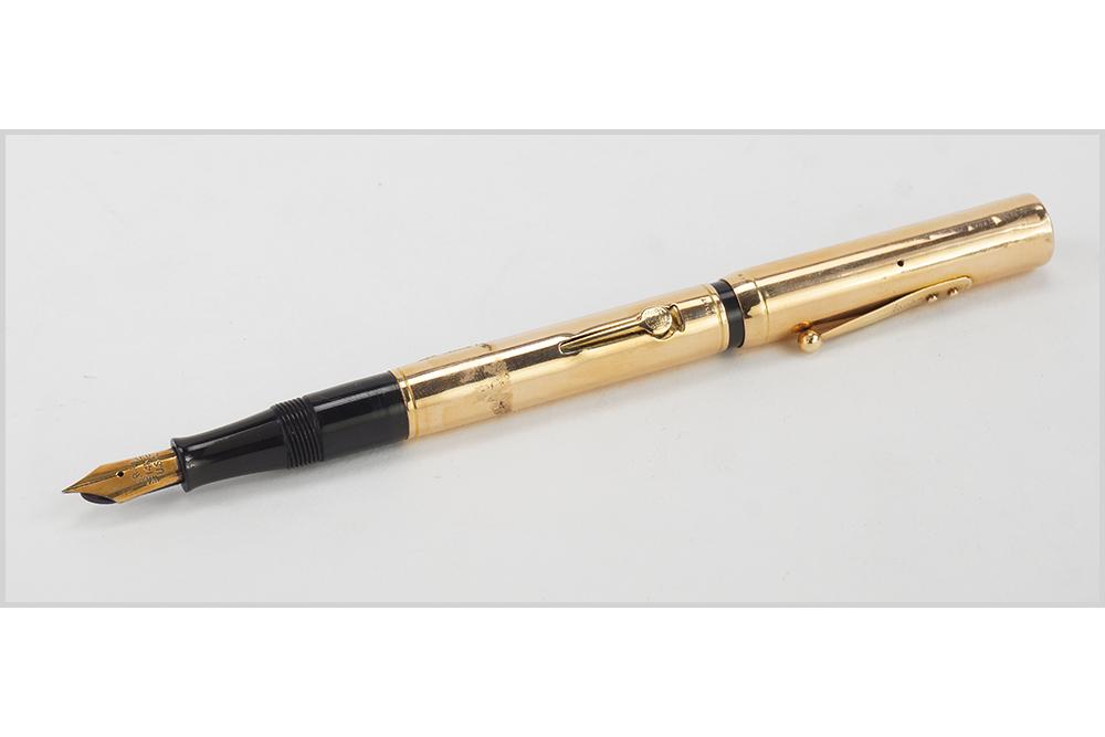 Ideal Waterman 14K Gold Fountain Pen.: Ideal Waterman 14K Gold Fountain Pen. A Waterman fountain pen in 14k yellow gold with a 14k gold nib, in the original box Length: 5.25"
