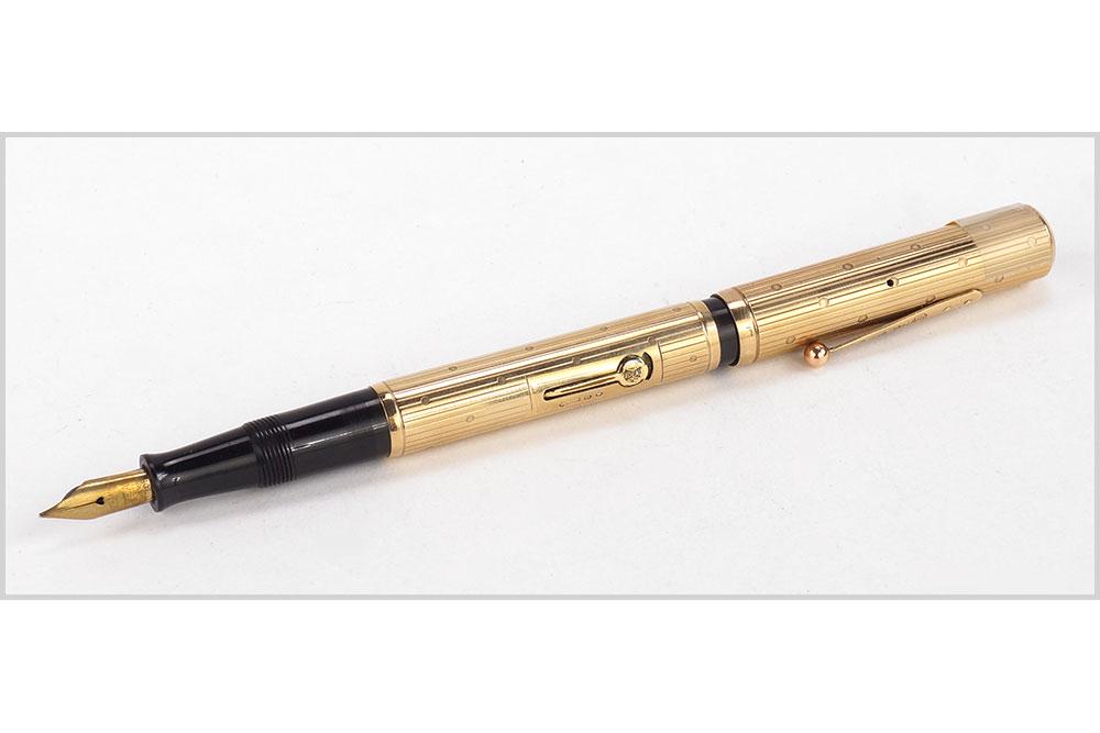 Waterman 9ct Gold Fountain Pen.: Waterman 9ct Gold Fountain Pen. Featuring the 9ct yellow gold Ideal Waterman fountain pen in the original box Length: 5.25"