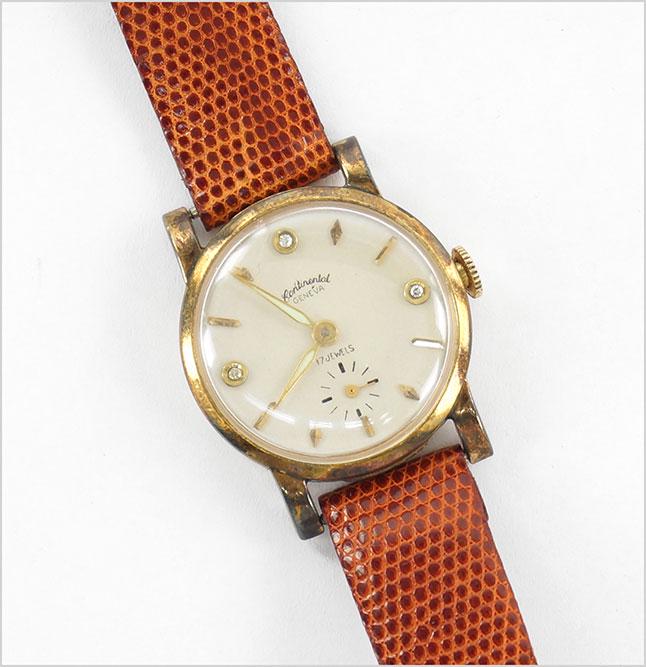 A Continental 14 Karat Yellow Gold Watch. (1 of 1)