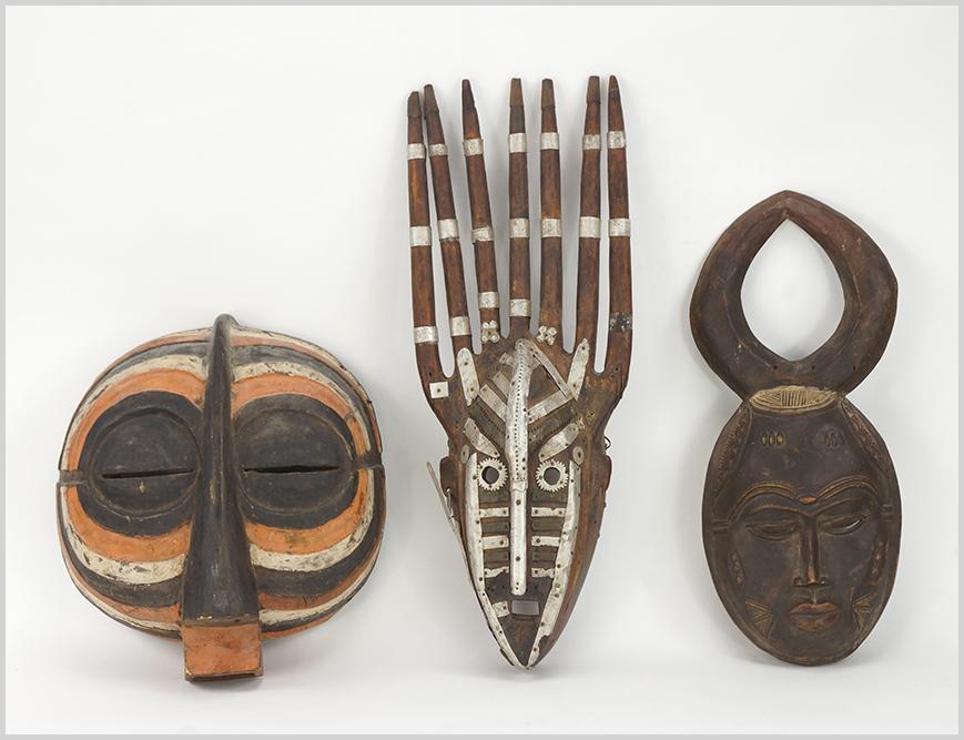 Three African Carved Wood Masks. (1 of 1)