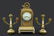 A French Raingo Freres Clock and Garniture Set.