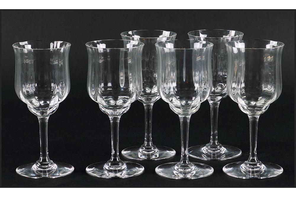 A Set of Six Baccarat Crystal Claret Wine Glasses in: A Set of Six Baccarat Crystal Claret Wine Glasses in the Capri Optic Pattern. With original box Height: 6"