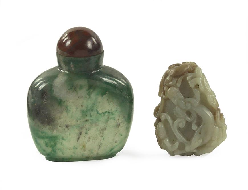 A Chinese Carved Emerald Snuff Bottle. (1 of 1)