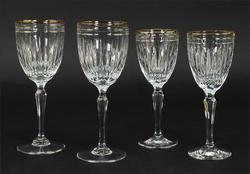 A Collection of Waterford Crystal Stemware in the: A Collection of Waterford Crystal Stemware in the Marquis Hanover Gold Pattern. Including eleven water goblets (height: 8 1/2") and thirteen wine glasses (height: 7 5/8")