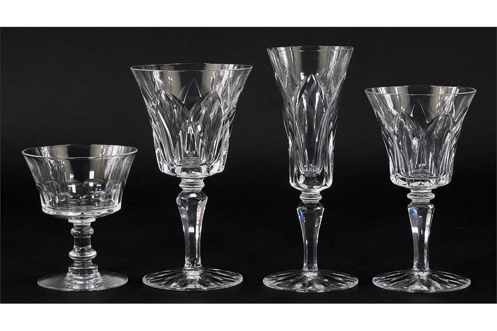 A St. Loius Crystal Partial Stemware Service.: A St. Loius Crystal Partial Stemware Service. Including five champagne flutes, ten water goblets, and six wine glasses. Together with a set of ten Fostoria sherbet glasses (height: 4") Flute height: 7