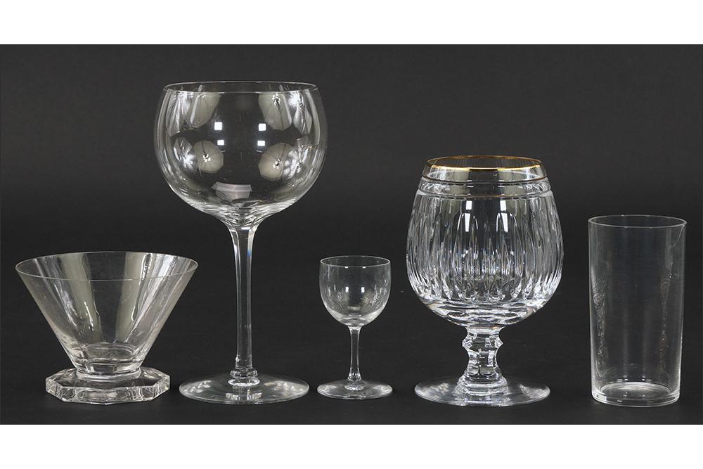 A Collection of Glassware.: A Collection of Glassware. Including a pair of Cartier balloon wine glasses, a pair of Waterford gilt rim snifters, three Lalique footed glasses, a pair of Baccarat juice glasses, and a set of eight B
