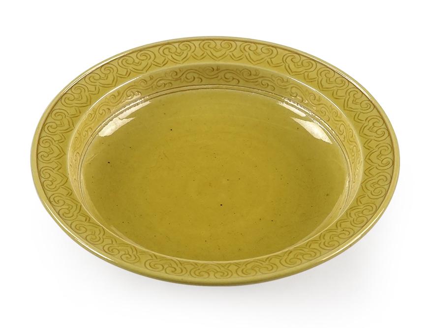 A Chinese Yellow Glazed Footed Dish. (1 of 2)