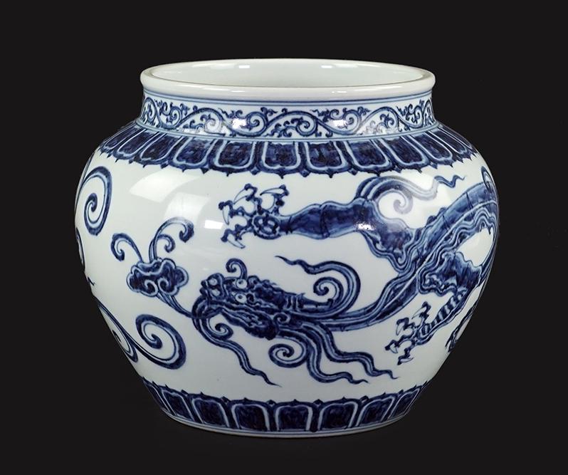 A Chinese Blue and White Porcelain 'Dragon' Jardiniere. (1 of 2)
