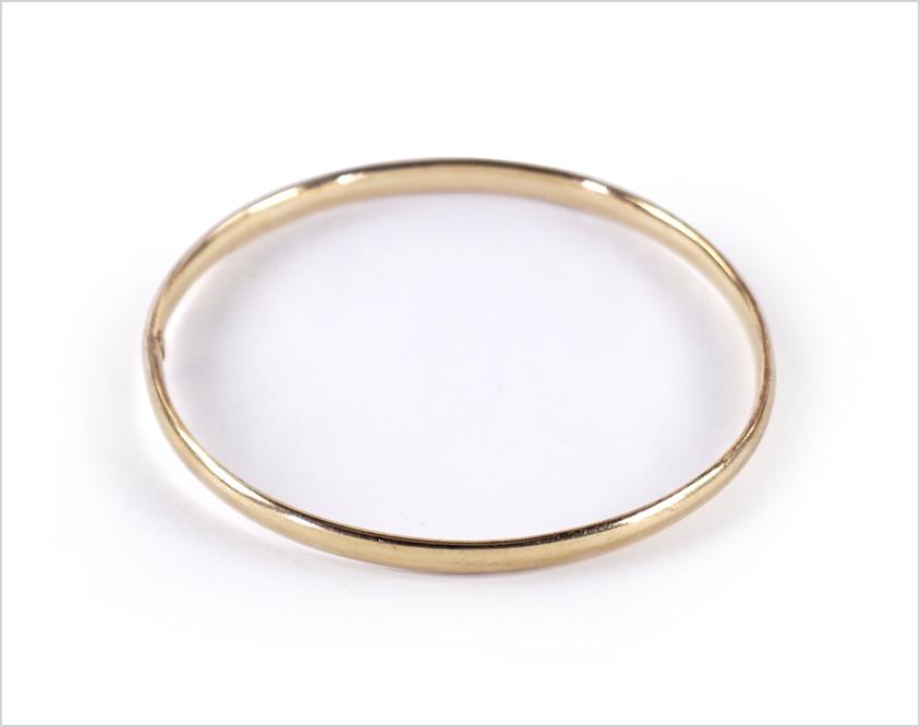 A 14 Karat Yellow Gold Bangle Bracelet. (1 of 1)