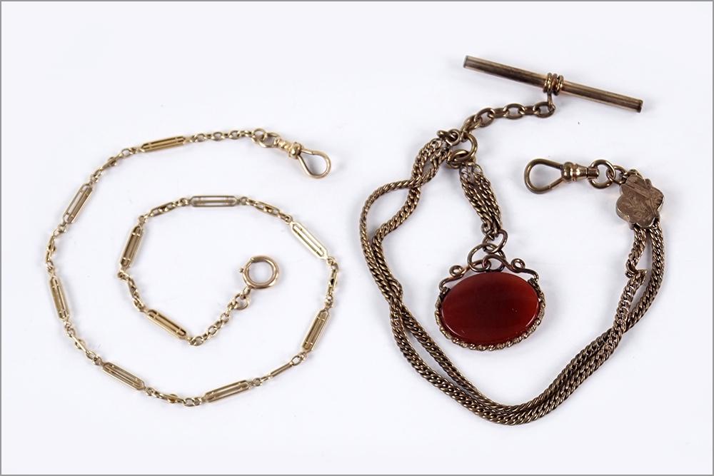 A Victorian Goldfilled Watch Chain.: A Victorian Goldfilled Watch Chain. One with a carved plastic cameo fob