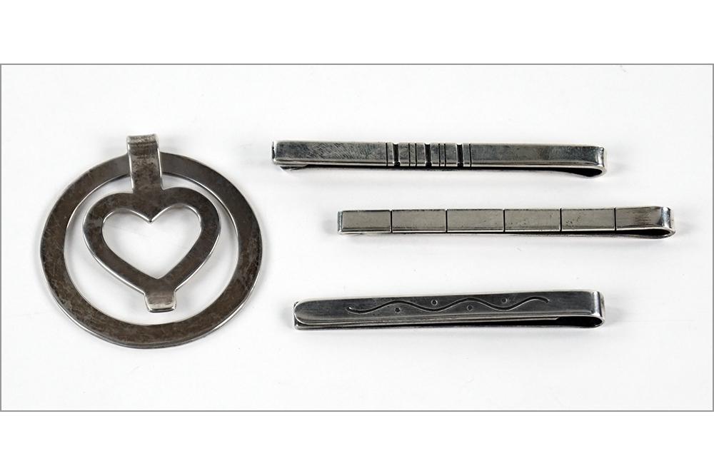 Two Just Andersen Sterling Silver Tie Bars.: Two Just Andersen Sterling Silver Tie Bars. Together with a Georg Jensen sterling silver heart form money clip and a Hans Hansen sterling silver tie bar Wt of all: 53.9 grams