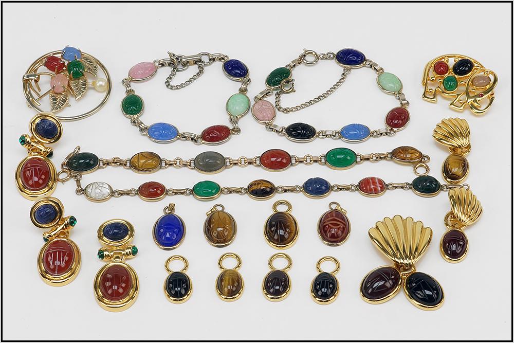 Four Scarab Link Bracelets.: Four Scarab Link Bracelets. Together with a Scarab elephant form brooch, a pair of scarab earclips with pendant, and a pair of earclips and a pendant with interchangeable scarab drops