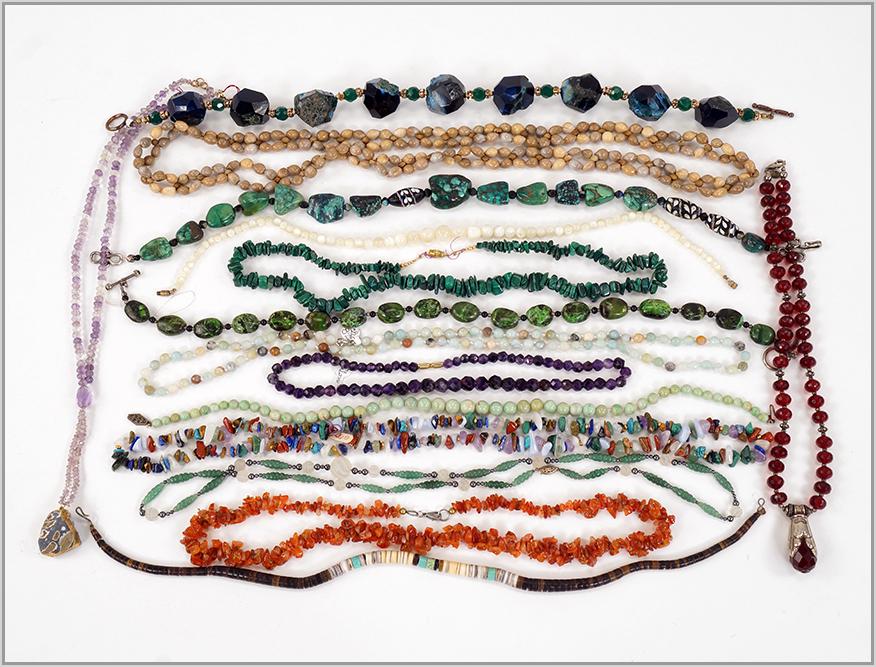 A Collection of Semi-Precious Stone Necklaces.: A Collection of Semi-Precious Stone Necklaces. Comprising malachite, carnelian, compressed turquoise, amethyst, quartz and other