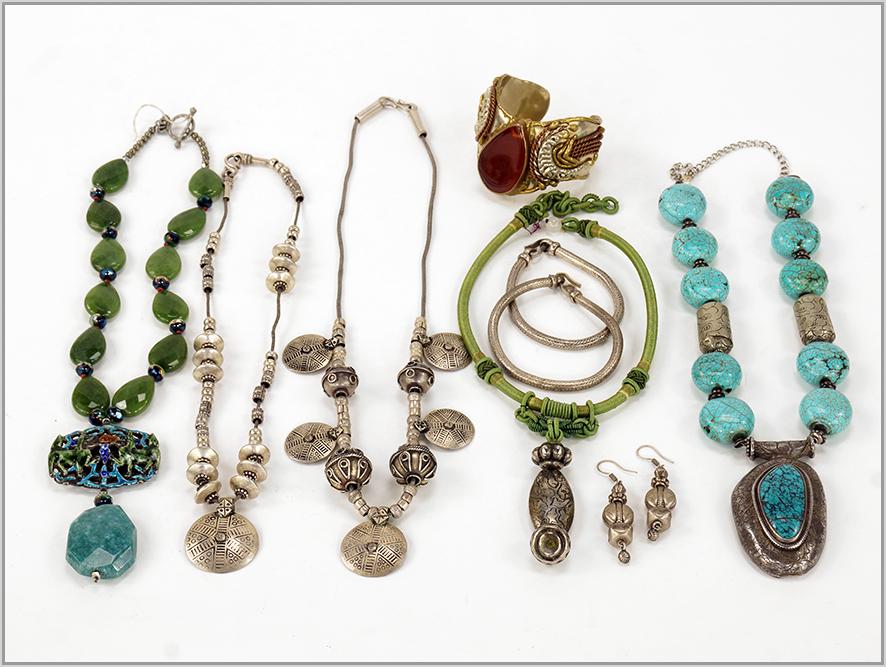 A Collection of Jewelry.: A Collection of Jewelry. Comprising five necklaces, two bracelets and one carnelian cuff bracelet