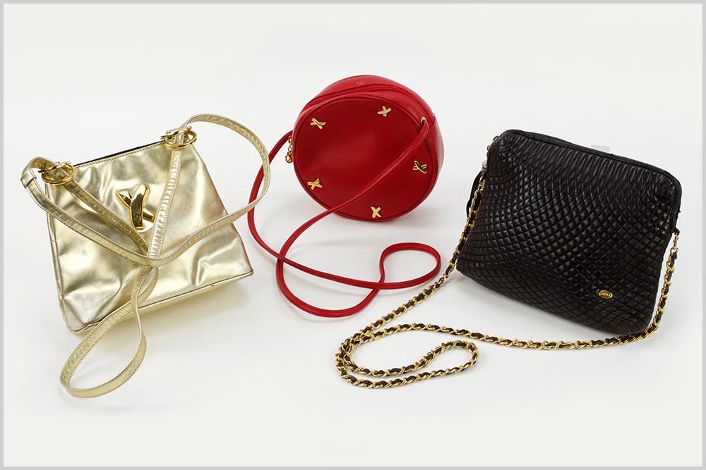 A Bally Quilted Black Leather Cross Body Bag.: A Bally Quilted Black Leather Cross Body Bag. Together with two Paloma Picasso leather cross body bags Bally: 8" x 10"