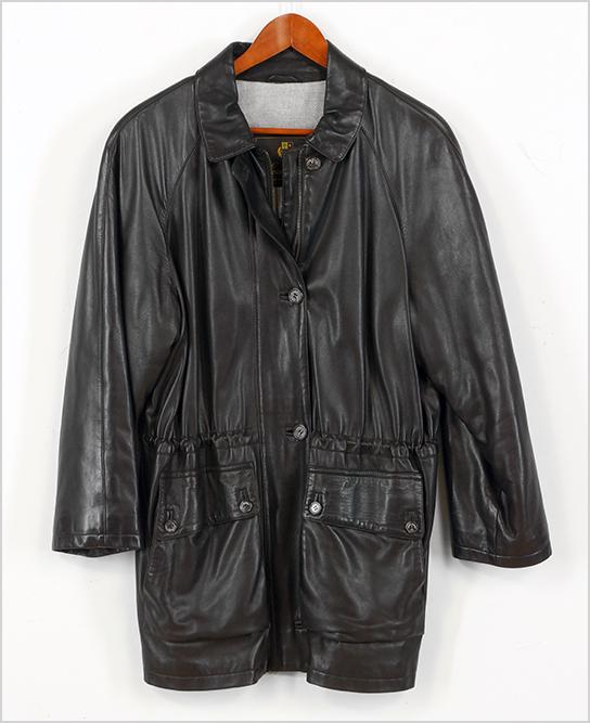 A Loro Piana Leather Coat.: A Loro Piana Leather Coat. Brown leather coat with a zip and button closure, cinch waist and cashmere lining Size: large