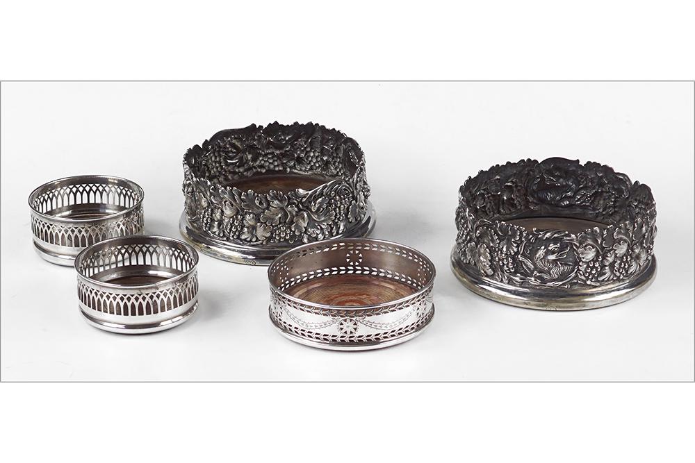 A Pair of English Sheffield Silverplate Wine Coasters.: A Pair of English Sheffield Silverplate Wine Coasters. Decorated with grape bunches and hunting dogs, hallmarked for Hawksworth, Eyre & Co. Together with a smaller pair of English silverplate wine coa