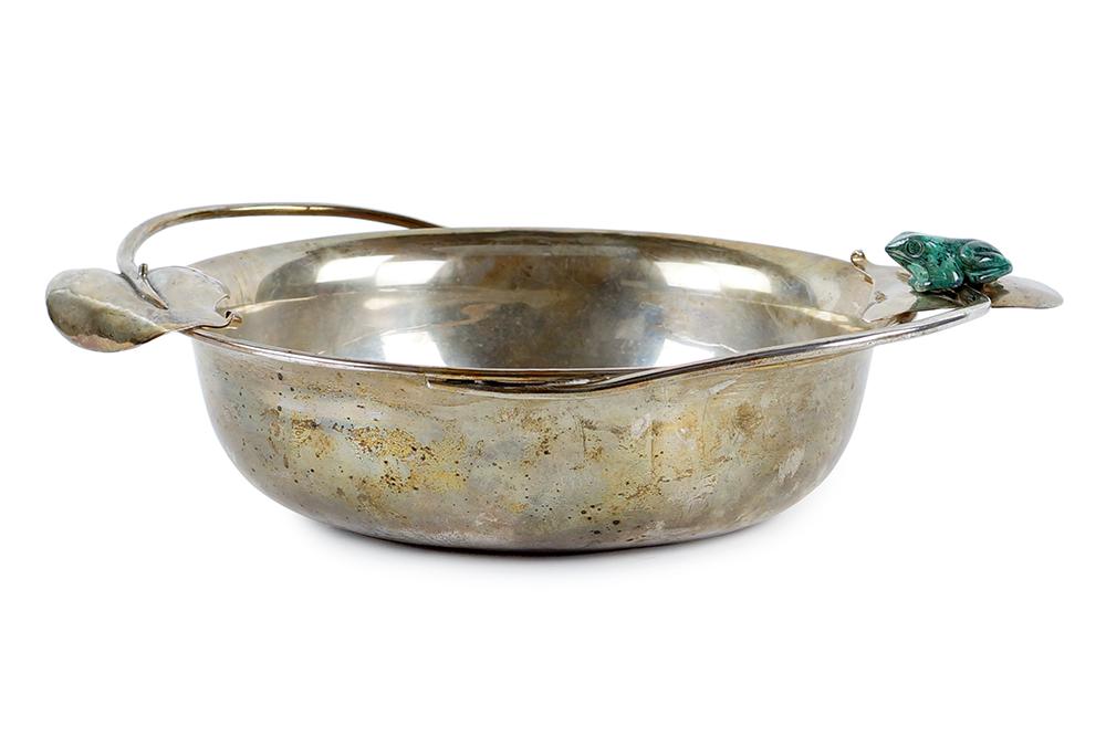A Los Castillo Bowl.: A Los Castillo Bowl. Round silverplate bowl with leaf form handles and a malachite decorated frog 3.5" x 14" x 11"