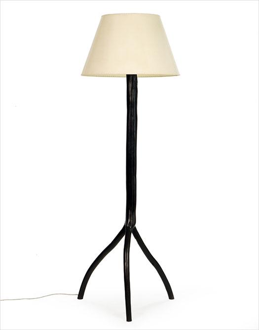 A Tripod Form Patinated Metal Floor Lamp. (1 of 2)