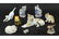 A Group of Ceramic and Porcelain Cat Figurines.