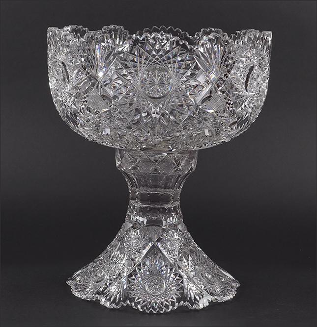 A T.B. Clark Alpenglow American Brilliant Cut Glass: A T.B. Clark Alpenglow American Brilliant Cut Glass Punch Bowl. 1908 T.B. Clark two-piece punch bowl withpedestal base. Number 571 bowl and pedestal 14" x 12"