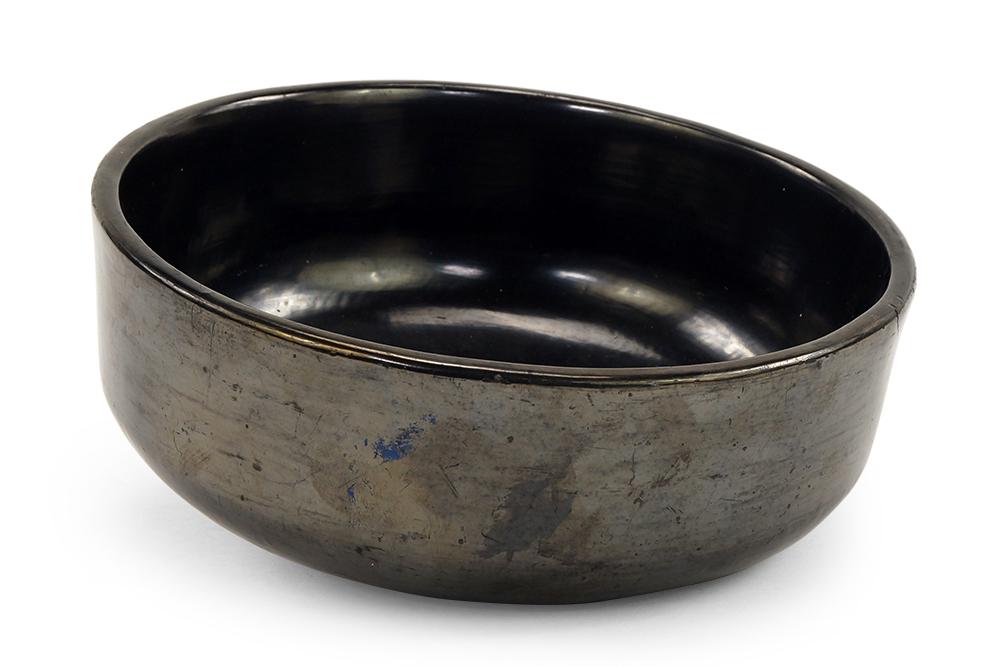 Maria Martinez (San Ildefonso, 1887-1980) A Blackware: Maria Martinez (San Ildefonso, 1887-1980) A Blackware Pottery Bowl. Signed on the underside 3 1/2" x 8 3/4"