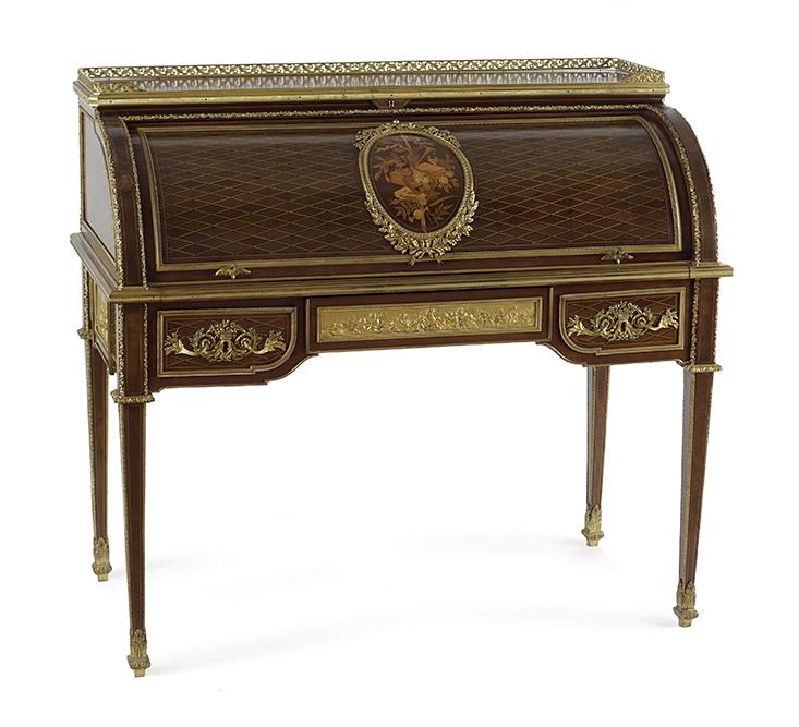 A Louis XVI Style Ormolu Cylinder Bureau.: A Louis XVI Style Ormolu Cylinder Bureau. Bearing a center inlaid medallion with decorative brass accents and brass relief cherubs on both sides 43" x 46" x 24.5"