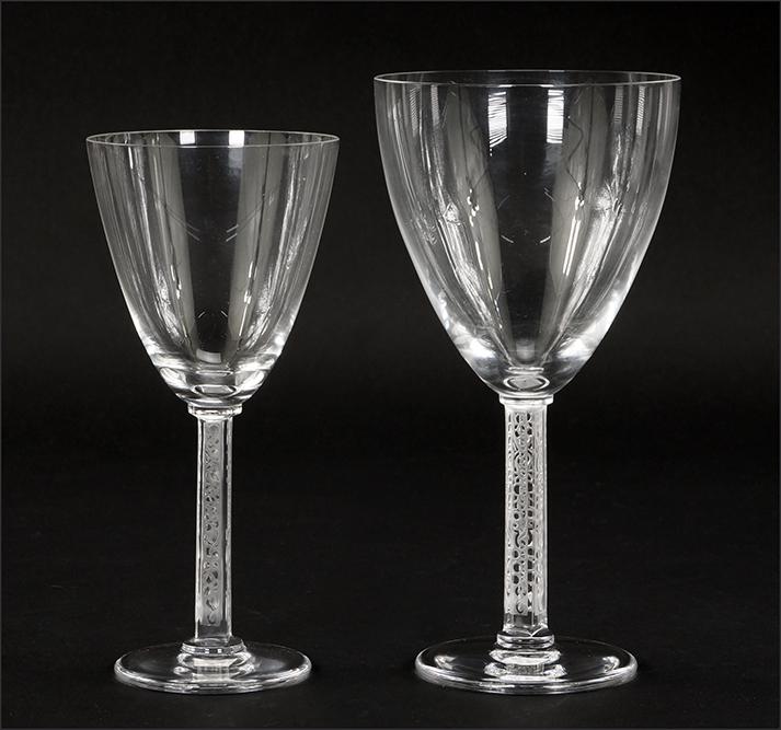 A Lalique Stemware Service.: A Lalique Stemware Service. Phalsbourg pattern. Comprising 14 tall water goblets and 13 claret wine goblets. With two Lalique fitted boxes