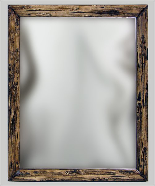CARVED AND PAINTED WOOD MIRROR.