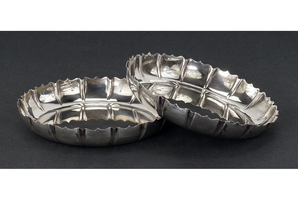 A Pair of Buccellati Sterling Silver Wine Coasters.: A Pair of Buccellati Sterling Silver Wine Coasters. Lobed sides with scalloped edges. Both are stamped along the side "Buccellati Sterling Italy" 3/4" x 4 1/2" Wt: 6.35 ozt