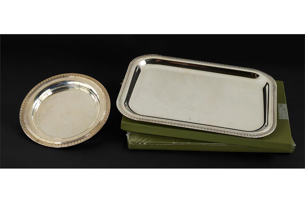 A PAir of Christofle Silverplate Trays.: A PAir of Christofle Silverplate Trays. Malmaison Beauharnais pattern. One is in an unopened Christofle box, one is accompanied by the original Christofle box. Together with a Christofle round silverp