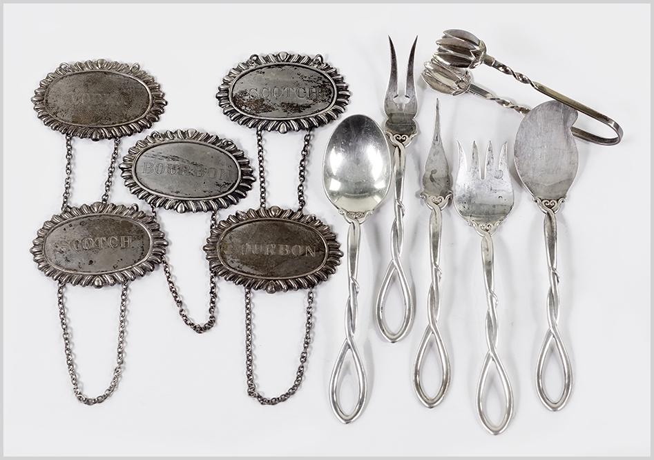 A Set of Five Sterling Silver Decanter Tags. (1 of 1)