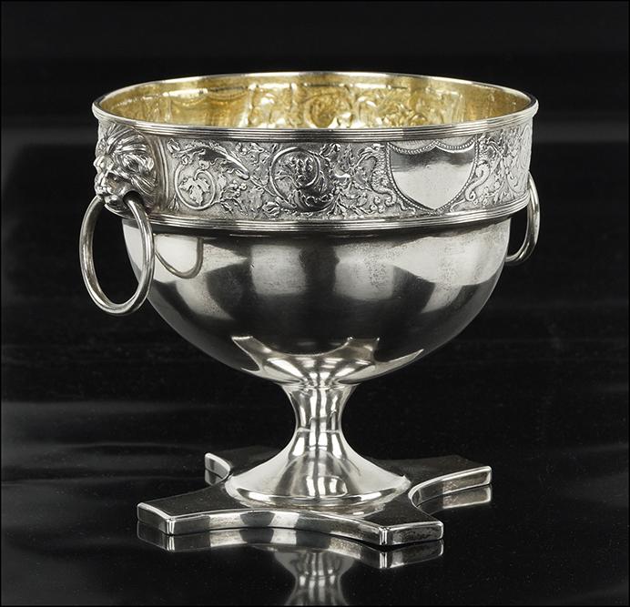 A Danish Silver Footed Cup.: A Danish Silver Footed Cup. .826 silver cup with lion's head form handles. Underside bears three tower mark and a maker's mark of "BS" 4.5" x 5.5", Wt: 10.65 ozt