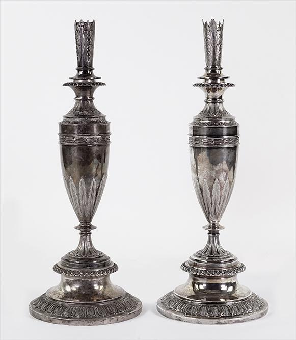 A Pair of English Victorian Silver Candlesticks. (1 of 2)