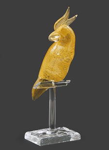 An Oscar Zanetti Murano Glass Cockatoo.: An Oscar Zanetti Murano Glass Cockatoo. Bearing gold flecks, mounted to a colorless glass perch form base, signed on the reverse of the base Height: 20"