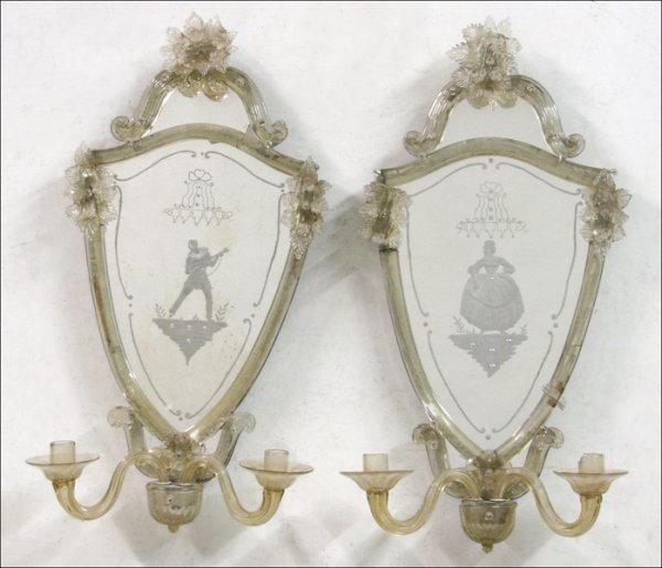 PAIR OF VENETIAN MIRRORED TWO-LIGHT WALL SCONCE: PAIR OF VENETIAN MIRRORED TWO-LIGHT WALL SCONCES. With etched central figures of a man and woman 27" x 14"