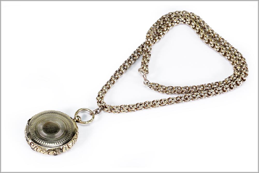 A 19th Century Yellow Gold Mourning Locket Necklace.: A 19th Century Yellow Gold Mourning Locket Necklace. 14 karat yellow gold necklace with a 14 karat yellow gold double sided locket. Locket is engraved on one side "In memory of / Mary Lane Anderson / 