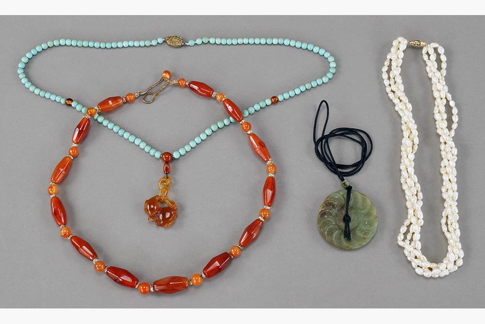 A Chinese Turquoise and Agate Necklace.: A Chinese Turquoise and Agate Necklace. Together with an agate and carnelian bead necklace, a four strand freshwater pearl necklace and a carved soapstone disc pendant necklace Turquoise necklace leng