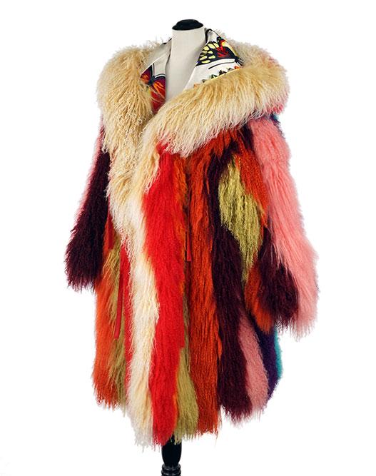 A Sam Kori George Mongolian Lamb Fur Coat.: A Sam Kori George Mongolian Lamb Fur Coat. 3/4 quarter length hooded multicolor coat with two red leather ties. With white silk butterfly lining Approximately size 12-14