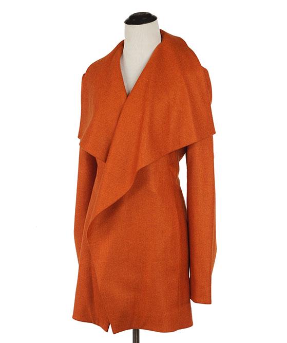 A Sam Kori George Cashmere Jacket.: A Sam Kori George Cashmere Jacket. Burnt orange jacket with silk lining Approximately size 10-12