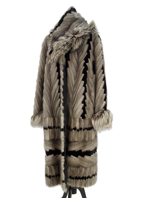 A Full Length Grey and Black Sculpted Mink Coat.: A Full Length Grey and Black Sculpted Mink Coat. With silver fox trimmed hood (removable) and cuffs Approx size 14