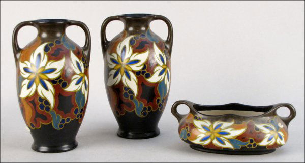 PAIR OF ZENITH GOUDA POTTERY VASES IN THE DAISY: PAIR OF ZENITH GOUDA POTTERY VASES IN THE DAISY PATTERN. Together with a Zenith Gouda pottery console bowl in the Daisy pattern Vase: 12" x 7" x 7" Bowl: 3.5" x 11.5" x 7"