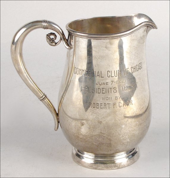 INTERNATIONAL STERLING SILVER PITCHER IN THE NO: INTERNATIONAL STERLING SILVER PITCHER IN THE NORSE PATTERN. Engraved "Commercial Club of Chicago, June 7 1939, President's Trophy Won By Robert F. Carr" 7.75" x 8" Wt: 30.75ozt