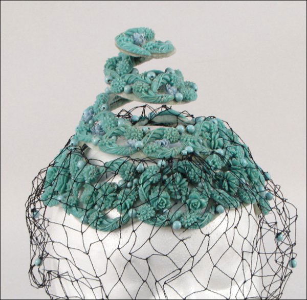 BES-BEN SPIRAL HAT.: BES-BEN SPIRAL HAT. Turquoise faux coral and black veil are adorned with turquoise colored beads