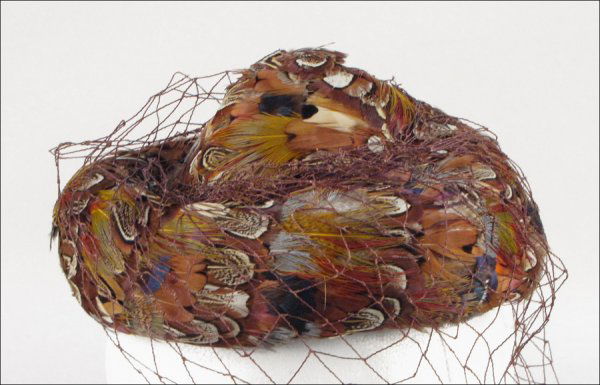 BES-BEN PHEASENT HAT.: BES-BEN PHEASENT HAT. Entirely covered in pheasent feathers with a brown veil