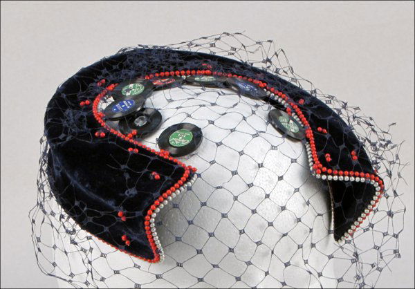 BES-BEN RECORDS HAT.: BES-BEN RECORDS HAT. Horseshoe form navy blue velvet hat is entirely trimmed in red and white beading. Open crown of hat contains nine records and a navy blue veil