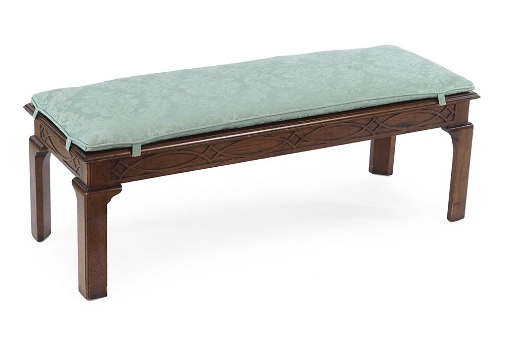 A Chippendale Style Mahogany Bench.: A Chippendale Style Mahogany Bench. With green damask cushion 16" x 47" x 17"