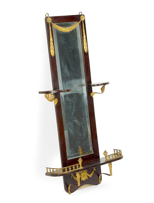 A Regency Style Mahogany Mirrored Etagere.: A Regency Style Mahogany Mirrored Etagere. Wall mount mahogany etagere shelf with mirrored back and gilt metal mountings throughout 40 1/2" x 21" x 5"