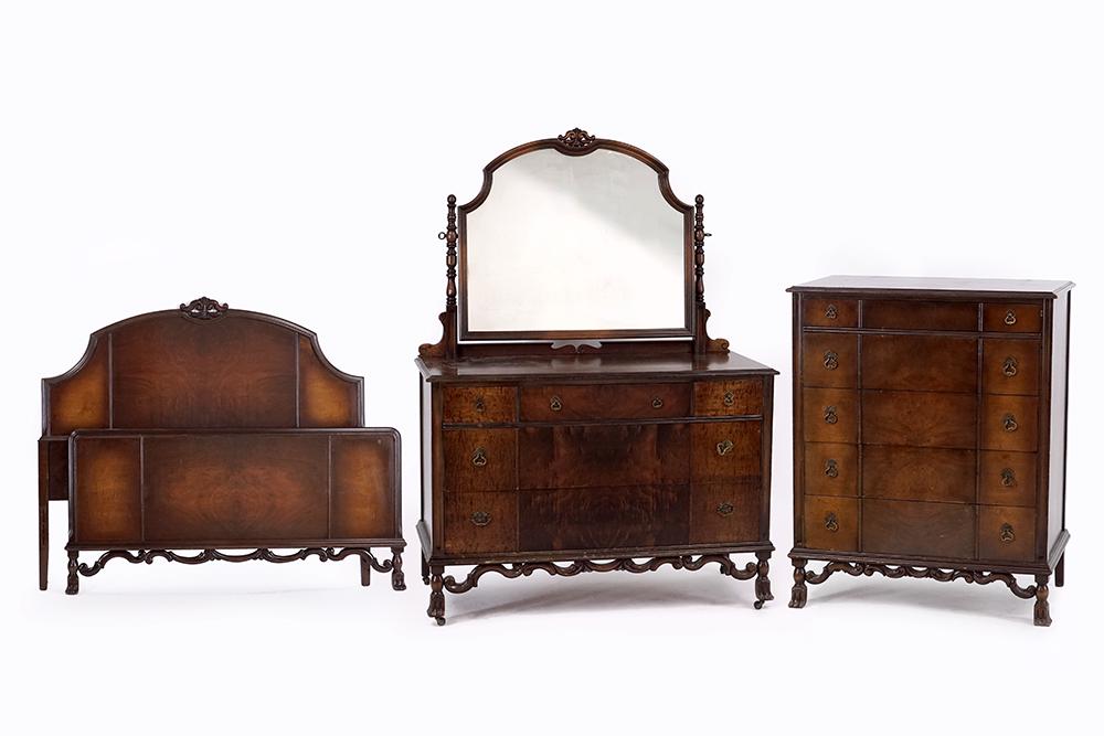 A Holland Furniture Co. Bedroom Set.: A Holland Furniture Co. Bedroom Set. Including a headboard (50" x 57") and footboard, a chest of drawers with vanity mirror (70" x 50" x 22"), and another chest of drawers (46" x 38" x 21")